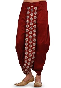 Art Dupion Silk Dhoti Pant in Maroon This Readymade piece is Enhanced with Resham Work Its Waist is Adjustable with a Drawstring Do note: Footwear shown in the image is for presentation purposes only. Half to one inch may vary in measurement. (Slight variation in actual color vs. image is possible) Dhoti Mens, Traditional Pants, Dhoti Pants For Men, Salwar Pants, Harem Pants Men, Dhoti Pants, Utsav Fashion, Dupion Silk, Aline Dress