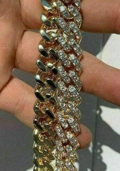 Men's 12mm wide Cuban Link Chain 
Real solid 925 sterling silver- 14k gold plated
 
Heavy 160-330 grams depending on length (22" is about 196 grams) 
Very heavy and solid weight to it
40-70ct man made diamonds all micropaved and set by hand!!!
Super ICY you have to see to believe!!
 
We have all lengths from 18-30"...wear it as a choker or as a longer chain
 
14k Gold over SOLID Sterling Silver...doesnt change color
Will never turn your neck green or t Gold Curb Chain Bracelet In Sterling Silver, Gold-toned Sterling Silver Curb Chain Bracelet, Gold Sterling Silver Bracelet With Curb Chain, Gold Cuban Link Sterling Silver Bracelet, Gold Cuban Link Bracelet In Sterling Silver, Silver 14k Gold Cuban Link Bracelet, Silver-toned 14k Gold Cuban Link Bracelet As Gift, Silver 14k Gold Cuban Link Bracelet As Gift, Luxury Diamond Figaro Chain Jewelry