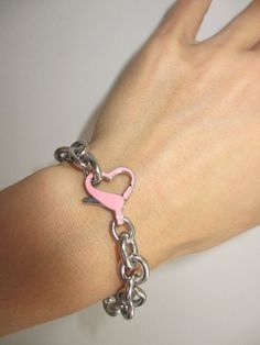 Chain Bracelet in Stainless Steel Clasp in 925 Sterling Silver with Pink Enamel Choose your size Handmade in Los Angeles - please allow up to 5 days for this item to ship THE PINK HEART CLASP BRACELET features an adorable heart clasp in 925 sterling silver with pink enamel on a rolo stainless steel chain. This piece will add a unique touch to all your looks! Trendy Pink Heart Bracelet With Heart Charm, Trendy Pink Heart Bracelet For Gift, Pink Charm Bracelet For Friendship With Lobster Clasp, Trendy Pink Jewelry With Bracelet Strap, Pink Metal Chain Bracelet As Gift, Trendy Personalized Silver Heart Bracelet, Trendy Pink Metal Bracelets, Pink Friendship Bracelet Jewelry, Trendy Pink Metal Bracelet