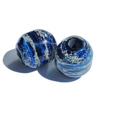 Celebrate the memory of your loved ones with our exquisite Remembrance Beads, thoughtfully crafted from high-quality borosilicate glass. Each ash bead is a unique work of art, available in a variety of beautiful colors. The process begins with laying out the chosen color, followed by carefully mixing the ashes with clear glass. The bead is then sealed in clear glass, ensuring it is completely waterproof and securely encases the ashes. Our Remembrance Beads measure approximately 5/8 of an inch ro Gift Recycled Glass Beads, Gift Recycled Glass Round Beads, Spiritual Recycled Glass Beads For Gifts, Recycled Glass Jewelry With Spacer Beads As Gift, Recycled Glass Spacer Beads Jewelry As Gift, Spiritual Glass Spacer Beads, Recycled Glass Round Beads Jewelry For Gifts, Recycled Glass Round Beads Jewelry Gift, Glass Beads Gift