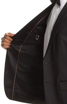 Contrast notch lapels frame the front of a clean, modern tuxedo crafted from pure virgin wool. Jacket has notched lapels Lined 100% wool Dry clean Made in Italy Hugo Boss/BOSS/HUGO has received the Fair Labor Association accreditation, which signifies that the company has effective systems and procedures in place to successfully uphold fair labor standards throughout its supply chains, including strategies and tools to address and improve working conditions This product meets Nordstrom Responsib Black Wool Tuxedo Blazer, Black Wool Sport Coat With Pressed Crease, Wool Tuxedo Blazer With Pressed Crease, Black Business Blazer With Structured Boning, Business Black Blazer With Structured Boning, Black Blazer With Structured Boning For Business, Luxury Wool Blazer For Black-tie Events, Wool Single Breasted Blazer For Black-tie Events, Black Business Outerwear With Structured Boning