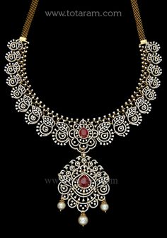 18 Karat Gold '3 in 1' Diamond Necklace with Color Stones & South Sea Pearls
  This Product has a Detachable Pendant which can be used as a separate Pendant with most Chains
  This Product has Inter Changeable Stones in the Necklace
  Length of the Pendant : 2.30 inches
  Width of the Pendant : 1.60 inches - 235-DN467 - in 81.850 Grams for USD $12747.05. 
Made in India by Totaram Jewelers Online this product is in Gold - 18 Karat Gold  & is an excellent gift for Adult - Women. Ships full Necklace Set Indian Bridal Jewelry, Detachable Pendant, Bridal Diamond Necklace, Choker Necklace Designs, Diamond Choker Necklace, Necklace Set Indian, Diamond Necklace Designs, Cellphone Wallpaper Backgrounds, Indian Bridal Jewelry