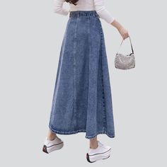 Long denim skirt with belt online—cool denim skirt from the 2022 Spring-Summer collection. The fashionable outfit helps to look stylish and draws the attention of others. Light blue is a popular, versatile color that is an excellent alternative to darker shades. Bleached pattern denim is the hottest trend for this season. The long fit type is usually form-fitting at the top and flowing from the waist down. High-waisted rise is naturally an excellent fit for those with an hourglass shape, as they Denim Skirt With Belt, Skirt Aesthetic, Womens Denim Skirts, Skirt With Belt, Long Denim Skirt, Denim Belt, Hourglass Shape, Light Blue Color, Hottest Trends