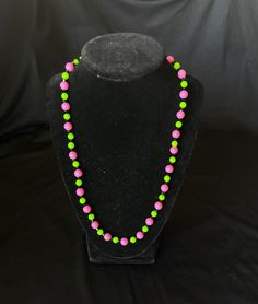 The pattern of this necklace is bubblegum pink and lime green beads.  Lightweight and cute. Green Large Beads Necklace For Party, Green Single Strand Jewelry For Party, Single Strand Green Jewelry For Party, Playful Pink Beaded Chain Jewelry, Playful Pink Jewelry With Beaded Chain, Playful Pink Jewelry With Large Beads, Playful Pink Necklace With Colorful Beads, Green Large Beads Party Necklace, Green Large Beads For Party