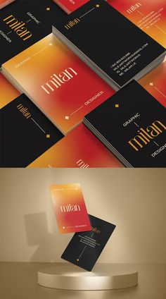 an assortment of business cards on display in different colors and sizes, with the same design