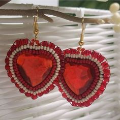 Handmade Beaded Bohemian Earrings In Red And Cream Glass Beads Surrounding Red Textured Heart Rhinestones Earrings Are Edged In Iridescent Red Chunky Beads And Fall In Elegant Hoop Shape. Beautiful + One Of A Kind Costume Materials Unless Specified Genuine Nickle-Free Iron Fishhook Style Earrings (In Gold Hue) + Silicone Backs Red Glossed Faux Leather Backing (Vegan Friendly) Indigenous Made In Canada Modern Boho Style Spot Wash With Damp Cloth (Do Not Saturate) Measurement 1 1/4inch1 1/4inch Modern Boho Style, Chunky Beads, Earrings In Gold, Bohemian Earrings, Style Earrings, Rhinestone Earrings, Beautiful One, Heart Jewelry, Modern Boho