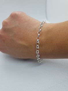 This beautiful delicated bracelet has been carefully crafted in solid 925 sterling silver. Great for any ocassion! Buy it for your-self or for someone you love . Bracelet can also be resized at no extra cost and it will be shipped to you in an elegant gift box. A tracking shipping number will be provided to you once the bracelet has been mailed. Bracelet length: 8 inches Weight: 5.1 grams Materials: 925 Solid Sterling Silver, also available in 10k Yellow Gold Lobster claw Thanks for visiting my White Gold Bracelet With Sterling Silver Clasp For Gift, Classic Sterling Silver Charm Bracelet Hallmarked, Sterling Silver Jubilee Bracelet For Anniversary, White Gold Bracelet With Sterling Silver Clasp, Sterling Silver White Gold Jubilee Name Bracelet, White Gold Sterling Silver Jubilee Name Bracelet, Anniversary Sterling Silver Jubilee Bracelet, Sterling Silver Bracelet With Silver Clasp As Gift, Sterling Silver Bracelet With Silver Clasp