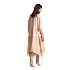 YAREN Turkish Towel pancho dress is high-quality, 100% Bamboo with fringes. One Size. Absorbs water and dries quickly. Light and space saving. Hand loomed in Turkey. Produced by dyed yarn. All fringes are knotted by ladies in the village. ⬛ DETAILS Weight : 250 g Size : Standart one size. - A gentle wash with cold water, makes the towel more absorbent and softens the fabric. - Up to ±10% change on dimension and weight, imperfections in pattern and color must be tolerated as a result of handloom Beige Sarong For Summer Beach, Summer Beachwear Tunic For Beach Cover-up, Short Sleeve Beach Dress For Beach Season, Cotton Beachwear Dress For Beach, Cotton Beach Dress For Beach Season, Summer Tunic For Beach Season Loungewear, Summer Beachwear Tunic For Loungewear, Beige Beachwear Kaftan For Vacation, Relaxed Fit Tunic Cover-up For Beach Season