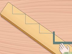 a hand measuring the length of a wooden stair