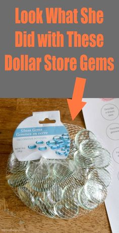 the dollar store gems are in plastic bags on top of a wooden table with text overlay that reads, look what she did with these dollar store gems