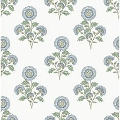 blue and white floral wallpaper with green leaves on the bottom right hand corner,