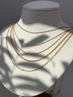 "14k Chain Necklace Cable Oval Round/Box/Twisted Singapore /Fancy Twisted Solid/Figaro Yellow Gold (16\"-22\") Introducing a luxurious addition to any jewelry collection - the 14k Gold Chain Necklace Cable Oval/Box/Twisted Singapore /Fancy Twisted Solid/Figaro Yellow Gold. Crafted from the finest real 14k gold, this exquisite chain will add a touch of elegance to any ensemble, and effortlessly transition from day to night with ease. With sizes ranging from 16\" to 22\", this timeless piece is pe Gold Oval Jewelry With Delicate Chain, Oval Gold Jewelry With Delicate Chain, Gold Chain Necklace With Tarnish Resistant Oval Pendant, Gold Chain Necklace With Oval Pendant, Tarnish Resistant, Gold Oval Pendant Chain Necklace, Tarnish Resistant, Oval Gold Plated Necklaces, Gold Plated Oval Necklace, Dainty Oval Gold Necklace, Gold Oval Cable Chain Jewelry