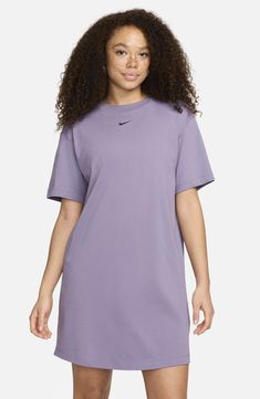 Take your athleisure game to the next level with a soft cotton jersey dress that feels like your favorite Nike T-shirt in a comfortably oversized fit. 34 1/2" length (size Medium) Crewneck Short sleeves Unlined 100% cotton Machine wash, tumble dry Imported Casual Solid Color T-shirt Dress For Loungewear, Casual Cotton T-shirt Dress With Relaxed Fit, Casual Relaxed Fit T-shirt Dress For Everyday, Casual Everyday T-shirt Dress With Relaxed Fit, Casual Cotton T-shirt Dress, Casual T-shirt Dress For Loungewear, Casual Everyday T-shirt Dress With Crew Neck, Solid Color Cotton T-shirt Dress With Crew Neck, Casual Cotton Crew Neck T-shirt Dress