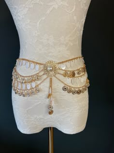 Belly Chain belt with intricate detail. White drops with Coins and Pearl centre Main colour is gold Price per piece White Dress Gold Jewelry Outfit, Chain Link Dress, White And Gold Outfits, Chains Design, Hip Jewelry, Gold Body Jewelry, Chain Skirt, Funky Hats, Gold Body Jewellery