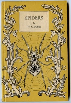 an old book with spider's on it