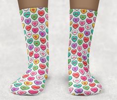 "Conversation Heart Socks, Valentine's Day Socks, Socks for kids, Socks for adults, Fun toddler socks, novelty socks, custom socks, kid socks Our comfortable socks have Polyester/Spandex construction that print great and stretch well. The patented Soft Touch thread provides a soft feel. Please see description of sizes available below. TODDLER ANKLE Toddler shoe size 6-11 Cuff 1.75\" Approx. Length (Including Cuff) 6.5\" Approx. Width 2.5\" TODDLER KNEE HIGH/KIDS CREW Toddler shoe size 6-10 Kid shoe size 11-4 Approx. Length 10\" Approx. Width 3\" KIDS KNEE HIGH/ADULT CREW Kids shoes size 10-3 Ladies shoe size: 4-12 Men shoe size: 6-13 Approx. Length 13.5\" Approx. Width 3.5\" YOUTH/ADULT NO SHOW ANKLET Kids shoe size 2 & Up Ladies shoe size: 4-12 Men shoe size: 6-12 Approx. Length 7.25\" Ap Personalized White Socks Gift, Cute Multicolor Socks For Gifts, Customizable White Socks For Gifts, Customizable White Socks As Gift, Customizable White Socks For Gift, Fun White Socks As Gift, Funny Multicolor Socks For Gift, Fun White Socks As A Gift, Funny Multicolor Socks For Gifts