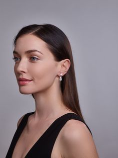 The Liz Teardrop Earrings are a timeless classic earring perfect for a bridal earring or black tie affair. 925 Rhodium Plated Sterling Silver.Handset Pear and Round Cut Flawless CZ Premium.Quality Grade 5A Cubic Zirconia.7/8th's of an inch long Timeless Teardrop Diamond Earrings For Evening, Luxury Teardrop Bridal Earrings For Formal Occasions, Classic White Gold Earrings, Classic White Gold Earrings With Timeless Design, Classic Dangle Diamond Earrings For Evening, Elegant Teardrop Diamond Earrings Brilliant Cut, Classic Evening Dangle Diamond Earrings, Classic Teardrop Diamond Earrings For Evening, Elegant White Gold Drop Diamond Earrings