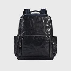 Whether you're on your way to the office, participating in business meetings, or setting off for a weekend getaway, this leather backpack serves as the ideal companion for the modern man on the move. Its versatile design seamlessly transitions between professional settings and casual outings, ensuring that you make a stylish statement wherever you go. The leather construction not only adds a touch of sophistication but also guarantees durability for your on-the-go lifestyle. Equipped with ample storage space, it accommodates your work essentials during weekdays and seamlessly transitions to a reliable travel companion for your weekend escapades. The thoughtfully crafted details and modern aesthetic make it a go-to accessory, effortlessly blending functionality with a refined sense of style Classic Commuting Laptop Bag With Luggage Sleeve, Functional Soft Leather Backpack, Leather Backpack For Business Trips With Luggage Sleeve, Leather Backpack With Luggage Sleeve For Business Trips, Modern Business Backpack With Leather Backing, Leather Laptop Bag With Luggage Sleeve For Commuting, Modern Leather Travel Backpack With Leather Lining, Modern Leather Backpack With Luggage Sleeve, Leather Laptop Bag For Business Trips