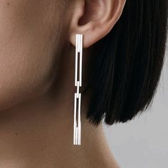 Minimal and elegant with a contemporary twist in design. New member to CONCORD family. This earring is designed to be worn in couple different ways. Made with secure closure on the bottom part it can be bend via hinge and close from the back of the ear. It can also have a more elegant version, when worn open and secured with standard silver earrings nut. You can choose to wear it as one or as a pair, please find more ways to style "aka jewellery" and share it with us! MATERIAL: - Available in si Architectural Earrings, Metal Art Jewelry, Metalwork Jewelry, Earrings Aesthetic, Contemporary Earrings, Art Jewelry Contemporary, Minimalist Studs, Classic Earrings, Jewelry Studio