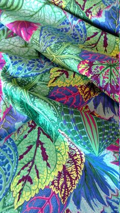 colorful fabric with leaves and flowers on it