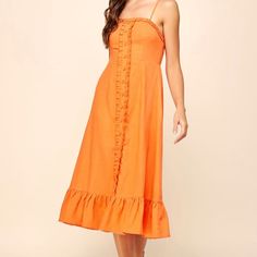 Sleeveless Ruffle Linen Midi Dress In Orange Orange Summer Midi Dress With Ruffles, Strapless Ruffled Sundress For Spring, Orange Ruffled Midi Dress For The Beach, Orange Ruffled Midi Dress For Vacation, Summer Ruffle Dress With Ruffled Straps For Date Night, Strapless Sundress With Ruffles, Strapless Ruffle Hem Summer Dress, Strapless Ruffle Dress For Summer, Strapless Summer Ruffle Dress With Ruffle Hem