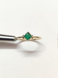 18K Gold Emerald Dainty Ring Solid Gold Emerald Ring 4 mm Square Emerald Ring Hallmarked 18K Gold Stacking Ring Natural Emerald Ring Men Metal : Yellow Gold Metal Carat : 18K Gemstone : Natural Emerald Stone Weight : 0.35 Ct Weight (US 5-US 18) : 1.5 gm - 2 gm approx. Ring Size: US 5-US 18 ✱Custom Order We love to accept Custom Order so feel free to throw us anything ✱Note : 1). Don't find your ring size or gemstone feel free to message me 2). Need this ring in another metal silver , white gold Heirloom Stackable Emerald Ring In Yellow Gold, Heirloom Yellow Gold Stackable Emerald Ring, May Birthstone Princess Cut Emerald Ring In Yellow Gold, Princess Cut Emerald Ring In Yellow Gold For Gift, Princess Cut Yellow Gold Emerald Ring For Gift, Yellow Gold Emerald Ring With Princess Cut For Promise, Princess Cut Yellow Gold Rings For May Birthstone, Yellow Gold Princess Cut Rings For May Birthstone, Yellow Gold Emerald Princess Cut Promise Ring