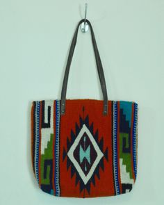 Multicolor Weaving Work Bag For Everyday, Everyday Multicolor Shoulder Bag With Weaving Work, Artisan Red Shoulder Bag For Everyday Use, Red Shoulder Bag With Leather Handles For Market, Brown Weaving Work Tote Shoulder Bag, Rectangular Red Bag With Weaving Work, Red Rectangular Bags With Weaving Work, Brown Tote Shoulder Bag With Weaving Work, Artisan Red Tote Shoulder Bag