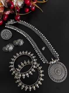 This minimalistic long oxidized necklace set is perfect for an Indian bride. Beautifully designed with German oxidized silver, this wedding set has a big intricate long Haram oxidized necklace, a pair of jhumki earrings, a ring, a pair of bangles, and a nose pin. This bridal oxidized set is available in six different patterns and sizes. Each of these pieces will work wonderfully on its own and even more elegant when worn together. You can also style them with your Navratri outfit or any ethnic o Bridal Jewellery Online, Oxidised Necklace, Unique Wedding Jewelry, Long Necklace Set, Long Haram, Oxidised Silver Jewelry, Indian Bridal Jewelry Sets, Necklace Set Indian, Temple Jewelry