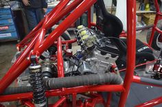 an engine sits in the center of a red frame