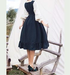 Vintage-inspired Dark Academia Dress with long flared sleeves, lace-up front and ruffles. S Bust: 84cm Waist: 66cm Length: 106cm M Bust: 88cm Waist: 70cm Length: 107cm L Bust: 92cm Waist: 74cm Length: 108cm XL Bust: 96cm Waist: 78cm Length: 109cm Long Sleeve Cotton Dress For Cosplay, Cotton Victorian Long Sleeve Dress For Fall, Cotton Prairie Dress With Ruffles For Fall, Long Sleeve Cotton Victorian Dress For Fall, Fall Victorian Long Sleeve Cotton Dress, Cotton Long Sleeve Victorian Cottagecore Dress, Cotton Victorian Dress With Long Sleeves In Cottagecore Style, Cottagecore Victorian Dress With Long Sleeves, Gothic Cotton Dress With Ruffles