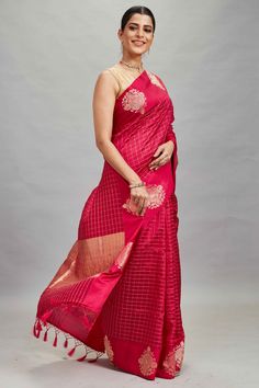 The charm of this red silk Banarasi sari is sure to leave everyone awestruck! It is enhanced with zari motifs border and comes with a green blouse piece. Disclaimer: The shown stitched blouse on the model is for display purpose only. The saree comes with a matching blouse piece and finished with fall and piko. Red Katan Silk Pre-draped Saree For Designer Wear, Red Art Silk Pre-draped Saree With Self Design, Red Tussar Silk Designer Pre-draped Saree, Red Tussar Silk Pre-draped Designer Saree, Red Slub Silk Saree For Eid, Red Slub Silk Pre-draped Saree With Dupatta, Red Anarkali Blouse In Slub Silk, Red Chanderi Pre-draped Saree With Zari Weaving, Red Slub Silk Blouse Piece With Traditional Drape