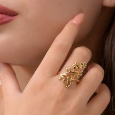 This exquisite 14 Gold Plated Silver floral Ring for Women is a stunning piece that effortlessly combines elegance and sophistication. Crafted with meticulous attention to detail, this ring showcases a beautiful blend of silver and gold, creating a captivating contrast that will instantly catch the eye. The gold adds a touch of luxury and brilliance to the overall design, making it the perfect accessory for any occasion. Designed especially for women, this ring features a sleek and feminine silh Elegant 14k Yellow Gold Filigree Ring, Elegant Yellow Gold Filigree Ring For Anniversary, Elegant Gold Flower Ring, Elegant Flower Ring For Formal Occasions, Elegant Yellow Gold Flower Ring For Wedding, Elegant Yellow Gold Wedding Flower Ring, Elegant Gold Plated Flower Ring For Wedding, Elegant 14k Gold Rings With Intricate Design, Elegant Gold-plated Flower Ring