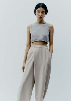 Timeless modernity pants designed to use them all year round. made from the greatest soft and light fabric. they have elasticated waistband on the back high rise and curved and cropped leg finished with side pockets and detailed with front pareo.    50% wv 55% upcycled pv Modern Cropped Bottoms With Relaxed Fit, Chic Viscose Wide-leg Pants, Versatile High-waisted Viscose Pants, Versatile Ankle-length Viscose Wide Leg Pants, Chic High-waisted Viscose Pants, Chic Beige Cropped Bottoms, Cropped Summer Bottoms For Daywear, Versatile High-waisted Culottes With Relaxed Fit, Versatile High-waisted Relaxed Fit Culottes