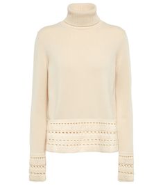 The Ventura sweater from Loro Piana is a luxurious addition to your cold-weather line-up. Made from soft off-white cashmere to a relaxed silhouette, it has a ribbed turtleneck â" ideal for cozying up in during rainy days â" and is finished with open knitwork along the hem. | Loro Piana Ventura cashmere knit sweater Ribbed Turtleneck, Loro Piana, Machine Knitting, Rainy Days, Online Branding, Cold Weather, Designing Women, Knit Sweater, Knitted Sweaters