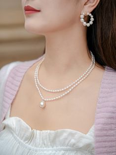 Introducing the "COCOKIM Embellished Series Double-Layer Pearl Necklace," a must-have accessory for pearl lovers. This necklace embodies princess elegance with its graceful double-layer design and sweet sophistication.Whether you're dressing up for a special occasion or adding a touch of elegance to your everyday look！ Metal: 14K Gold Filled Gemstone: Freshwater Pearl Small Pearl Dimensions: 60*40mm Large Pendant Pearls Dimensions: 180*150mm (including metal parts) Inner Chain Length: 380mm Oute Layered Pearl Necklace, Necklace Pearl, Charm Pendant Necklace, Layer Design, Tiger Eye Stone, Layers Design, Ring Bracelet, Stone Necklace, Chain Lengths