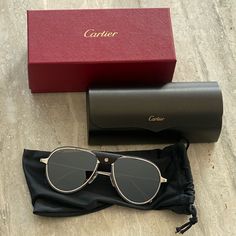 New With Packaging Cartier Men’s Sunglasses. Metal Titanium Material With A Brushed Ruthenium Finish, Gray Polarized Lenses. Ruthenium Finish, Aviator Shape. Black Calfskin Bridge *Please Note: Model Pic Is In Different Color Than What It For Sale But Same Look Classic Cartier Sunglasses For Formal Occasions, Elegant Silver Aviator Sunglasses With Mirrored Lenses, Elegant Aviator Sunglasses With Metal Frame For Formal Occasions, Formal Silver Sunglasses With Tinted Lenses, Classic Anti-reflective Sunglasses For Formal Occasions, Silver Sunglasses With Gradient Lenses For Formal Events, Silver Tinted Sunglasses For Formal Occasions, Silver Tinted Sunglasses For Formal Events, Classic Cartier Sunglasses With Mirrored Lenses