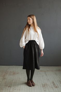 Below the knee skirt is made from 100% soft and washed linen. This Petticoat is perfect for wearing under dress or other skirt or can be worn alone. Match it with our tunics! Details: - Composition: 100% Oeko-Tex certified linen - Colour: black - Elastic waist - Pockets - Size: One size/fits all - Medium weight linen - Linen care: machine wash gentle; tumble dry low, ironing optional - The price is for one skirt, other pictured items are not included Spring Linen Mini Skirt In Relaxed Fit, Relaxed Linen Mini Skirt For Spring, Linen Mini Skirt With Relaxed Fit For Spring, Linen Midi Skirt With Lining, Linen Skirt With Relaxed Fit And Lining, Relaxed Linen Skirt With Elastic Waistband, Knee-length Linen Gathered Skirt, Flowy Linen Mini Skirt, Flowy Linen Skirt With Elastic Waistband