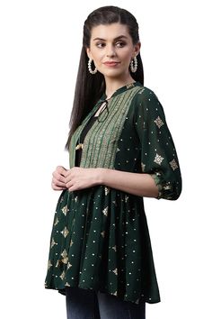 This georgette jacket type tunic is made by ahalyaa. It's look like gujarati kediya that people often wear in navratri night for playing garba. This tunic has broad lace in front for great detailing of tunic. Tunic has malai dori for tie up in front. Pair it with light colour jeggings and gold kohlapuris for that perfect ethnic look. You can wear this tunic as casually or even in party. Sizing tip : please refer to ahalyaa garment size chart n pick a garment size atleast 2" more than your body m Anarkali Style Front Open Georgette Dupatta, Navratri Bohemian Kurta In Georgette, Festive Front Open Georgette Choli, Front Open Choli With Zari Work For Navratri, Navratri Front Open Choli With Zari Work, Designer Bohemian Kurta For Navratri, Traditional Tunic With Traditional Drape For Festive Season, Bohemian Designer Kurta For Navratri, Bohemian Georgette Choli For Navratri