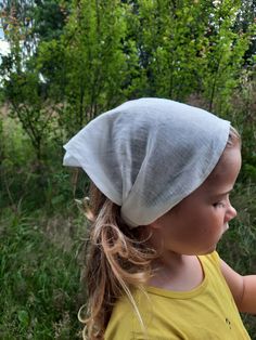 🎁Description. Linen summer headband with elastic in the back. Headband is cover head from the sun and it is comfortable to wear it all day along, because linen is breathable. Perfect for garden, beach & everyday. 🎁 Composition. 100% softened Europian linen.  🎁Size. *For girls 3+ years & over, fits head 50-54cm because of the elastic in the back. * For woman, fits head 54-58cm because of elastic in the back. 🎁Color. Milk white, but we have more colors. Please check the listing gallery. 🎁Care. You can keep the headband clean very easy, just wash it in the washing machine 🎁 Order procesing. Your order will be made for you in max 1 week & after will be shipped to you. Cotton Bandana For Beach In Summer, Summer Beach Cotton Bandana, One Size Fits Most Bandana For Spring Beach, Spring Cotton Adjustable Bandana, Adjustable Cotton Bandana For Beach, Spring Adjustable Cotton Bandana, Adjustable Cotton Bandana For Spring, Handmade Adjustable Summer Headband, Casual White Headscarf Headband