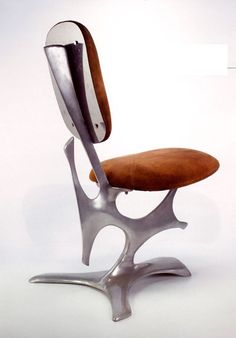 a chair that has been designed to look like it is made out of metal and leather