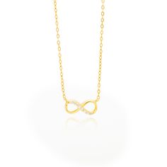 "Symbolising eternity, purity and everlasting love, this sterling silver 925 14ct gold plated infinity necklace from Little Silver is the perfect way to commemorate a special milestone in your friendship. Hand-crafted in genuine 925 sterling silver, each looping pendant floats elegantly from a 16\" (+2inch extender) necklace chain with a spring ring closure. Cubic zirconia pavé settings add a beautiful dimension of sparkle and texture to the appearance of this infinity chain necklace. Elegantly displayed in a gift-ready embossed  box with our brand name \"Little Silver'' in silver foil lettering, this piece makes a thoughtful and timeless necklace gift for women. Present this eternity necklace as an unforgettable gift for her for Christmas, Mother's Day, Birthdays, Anniversaries or \"just Anniversary Infinity Necklace With Delicate Chain, Dainty Infinity Necklace As Gift For Her, Gold Infinity Jewelry Gift For Her, Cubic Zirconia Infinity Necklace For Anniversary, Gold Infinity-shaped Jewelry Gift For Her, Dainty Infinity Cubic Zirconia Jewelry, Dainty Cubic Zirconia Infinity Jewelry, Gold Infinity Necklace Fine Jewelry, Gold Infinity Jewelry As A Gift For Her