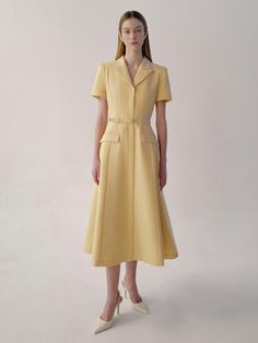 This is BAU by Bride And You’s mini dress, beloved for its classic design, features luxurious textured fabric and jacket-style details on the top, emphasizing a classic mood. The flared skirt adds to its femininity. The V-neck notched collar creates a slender neckline, while the spacious shoulder line covers the arms. Inside the skirt, there's a full lining that accentuates the skirt line, creating a more dimensional silhouette and structural body line.- Perfect for both daily wear and special occasions- Can be styled with various accessories to create different looks- Features a zipper at the back for easy wearing and removal- Pairing it with the optional belt provided will enhance the overall look Chic Semi-formal Dress With Structured Boning, Luxury Short Sleeve Midi Dress For Work, Semi-formal Dresses With Structured Boning, Tailored Semi-formal Dress With Structured Boning, Semi-formal Fitted Dress With Structured Boning, Spring A-line Single Breasted Dress, Spring Semi-formal Classic Jacket Dress, Spring Classic Semi-formal Jacket Dress, Luxury A-line Midi Dress With Fitted Bodice