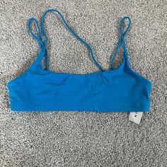 La Hearts By Pacsun Blue Zenna Strappy Tank Bikini Top. No Padding. Nwt Casual Swimwear With Straps For Pool, Casual Blue Tankini For Pool, Blue Triangle Top Tankini For Yoga, Blue Seamless Tankini For Beachwear, Beach Tankini With Straps In Solid Color, Blue Seamless Tankini For Beach Party, Blue Stretch Tankini With Adjustable Straps, Solid Color Strapped Tankini For The Beach, Solid Color Tankini With Straps For Beach