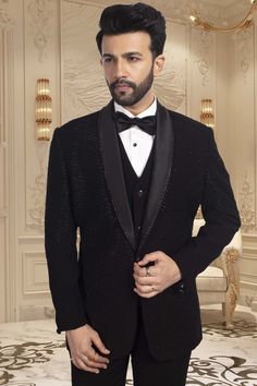 This TUXEDO- R14-S63 showcases stunning black cutdana embroidery, adding a touch of elegance and sophistication to your ensemble. Expertly crafted with precision and attention to detail, this tuxedo is the perfect choice for any formal occasion. Its intricate design is sure to make you stand out in the crowd. Elegant Tuxedo For Black-tie Festive Events, Fitted Blazer For Black-tie Festive Events, Festive Fitted Blazer For Black-tie Events, Designer Black Tuxedo For Groom, Luxury Fitted Tuxedo For Festive Occasions, Fitted Luxury Tuxedo For Festive Occasions, Festive Fitted Tuxedo For Black-tie Events, Festive Luxury Fitted Tuxedo, Tailored Evening Party Wear Suits