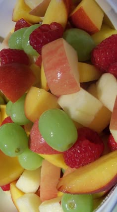 a bowl filled with lots of different types of fruit