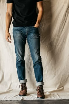 Slim fit Indigo Washed 10.5 oz What is denim weights? 96% COTTON/4% POLYURETHANE 4-Way stretch selvedge denim Made in USA Model is 6'2" and wearing a size 32. Our premium denim is inspired by the classic vintage blue jean. Our Premium Japanese 4-Way Stretch Selvedge denim story starts in Japan where our fabric is developed at one of the oldest denim mills. We blend a unique 4 way stretch material with selvedge denim to create a specific amount of stretch and comfort you wouldn’t typically get wi Classic Dark Wash Pre-washed Bottoms, Pre-washed Straight Leg Jeans For Fall, Fall Pre-washed Straight Leg Jeans, Rugged Straight Leg Washed Blue Jeans, Rugged Washed Blue Straight Leg Jeans, Rugged Washed Blue Jeans, Dark Wash Selvedge Tapered Leg Jeans, Medium Wash Jeans With Double-needle Stitching, Fitted Washed Indigo Jeans