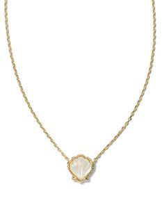 Inspired by carefree days spent collecting treasures on the beach, the Brynne Gold Shell Short Pendant Necklace in Ivory Mother-of-Pearl is too cute to miss. Featuring etched grooves for added texture, this shell-shaped pendant has signature Kendra Scott hoofprint detailing on its frame for an added textured touch. Stacked up or styled solo, this necklace will add that coastal chic aesthetic to your look. Metal 14k Yellow Gold Over Brass Material Ivory Mother-of-Pearl Closure Lobster Clasp W/ Single Adjustable Slider Bead Size 19" Chain, 0.60"L X 0.57"W PendantDue to the one-of-a-kind nature of the medium, exact colors and patterns may vary slightly from the image shown. | Kendra Scott Brynne Gold Shell Short Pendant Necklace in Ivory Mother-of-Pearl | Mother Of Pearl Hoof Print, Short Pendant Necklace, Preppy Jewelry, Kendra Scott Necklace, Bar Jewelry, Chic Aesthetic, Seashell Necklace, Coastal Chic, White Necklace