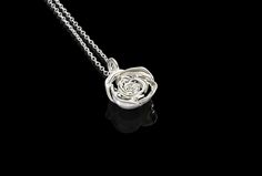 Elevate your outfit to a new level with silver-crafted rose pendant. The best gift for husband, lover and boyfriend. Shipping info. Silver production requires 15~17 business days. Please keep this in mind when purchasing. 1.Pendant info.[Width: 12mm] Material: Sterling Silver(High-gloss finish) Width: 12.44mm(0.48976378 inch) High With Loop: 18.63mm(0.73346457 inch) Loop Hole Size: 2.9 x 3.28mm(0.114173 x 0.1291339 inch) Weight: About 3.15 grams 2.Pendant info.[Width: 18mm] Material: Sterling Si Best Gift For Husband, Pendant For Men, Necklace Love, Rose Pendant, Rose Necklace, Necklace Rose, Small Rose, Mens Pendant, Beauty Items