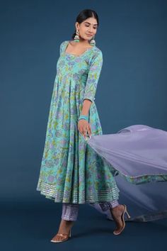 Aqua green anarkali with spring print and metallic panels. Paired with pant and printed hem dupatta.
Component: 3
Pattern: Printed
Type Of Work: Spring
Neckline: Square
Sleeve Type: Three Quarter
Fabric: Anarkali and Pant: Cotton, Dupatta: Organza
Color: Green
Other Details: 
Printed hem dupatta
Back tassel tie-up
Occasion: Puja - Aza Fashions Designer Pista Green Anarkali Set With Printed Motifs, Pista Green Anarkali Set With Printed Motifs, Pista Green Anarkali Set For Navratri With Printed Motifs, Navratri Pista Green Anarkali Set With Printed Motifs, Green Anarkali Set With Printed Motifs And Maxi Length, Green Floor-length Anarkali Set With Printed Motifs, Green Bollywood Anarkali Set With Printed Motifs, Green Chanderi Anarkali Set With Printed Motifs, Anarkali Salwar Kameez In Pista Green With Printed Motifs