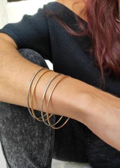 bangle braceletsilver braceletevery day braceletsilver cuff braceletcuff braceletwide cuff braceletgold bracelet cuffgold braceletgifts for hervintage banglesrose gold braceletrose gold bangledainty braceleDainty bangle bracelet!This handmade bracelet is an elegant piece. Its made from stainless steel and you can pick between 24k gold plated, 925  silver plated or Rose gold plated!You can wear it every day, the most important is that is anti allergic and nickel free!*** The listing is for ONE si Silver Everyday Bangle Bracelet, Metal Bangle For Everyday Wear, Everyday Metal Bangle, Minimalist Rose Gold Bangle Jewelry, Minimalist Rose Gold Bangle, Trendy Stackable Cuff Bangle Bracelet, Everyday Rose Gold Bangle Jewelry, Flexible Metal Jewelry As A Gift, Silver Hoop Bangle For Gift